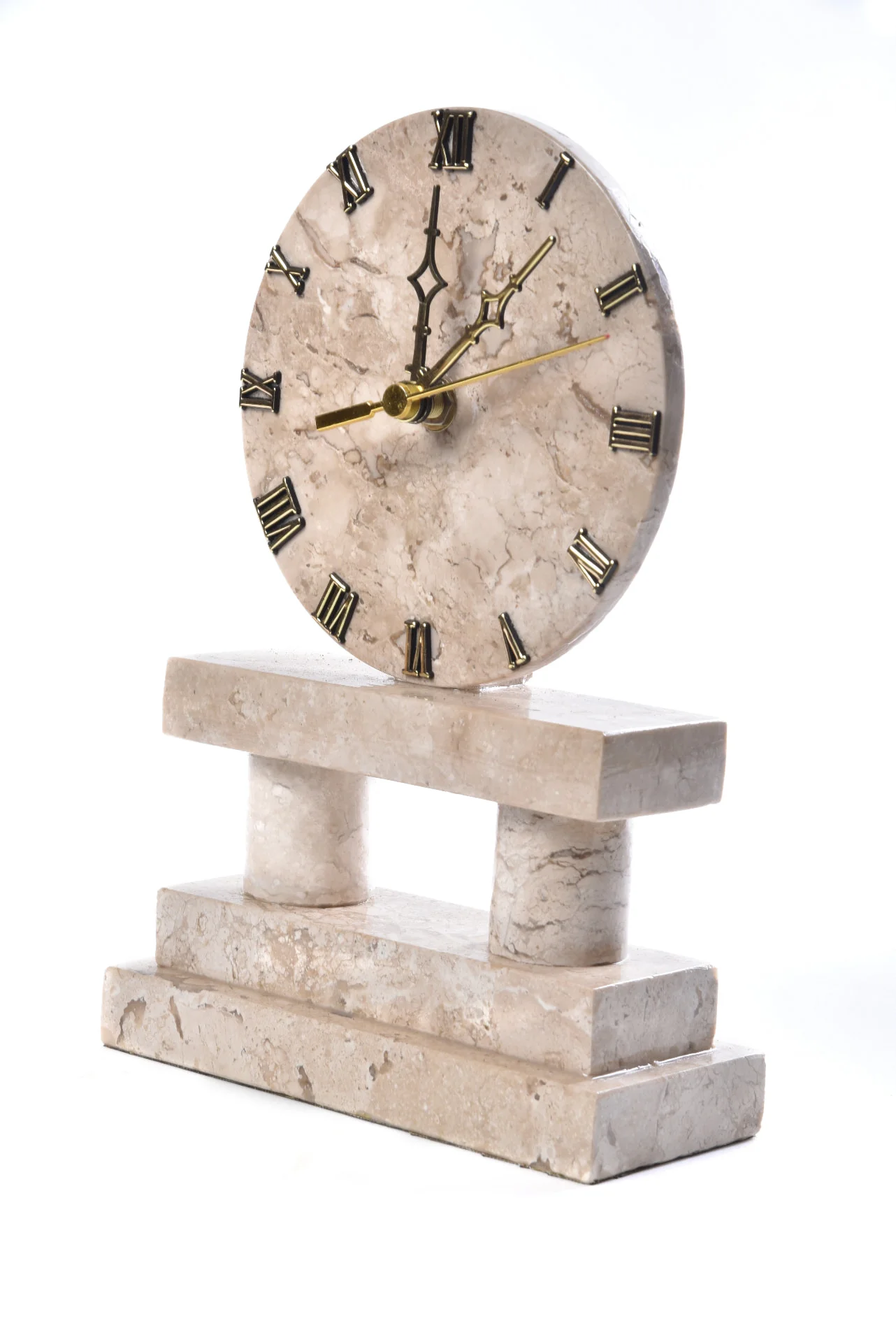 Beige travertine table clock with a round dial on a columned base